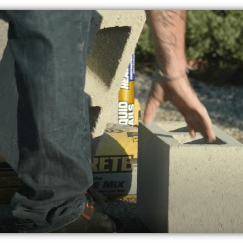 Dad working with cinderblocks