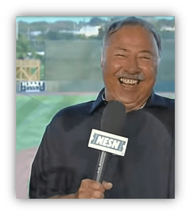 "Smiling sports commentator holding a microphone with NESN branding."