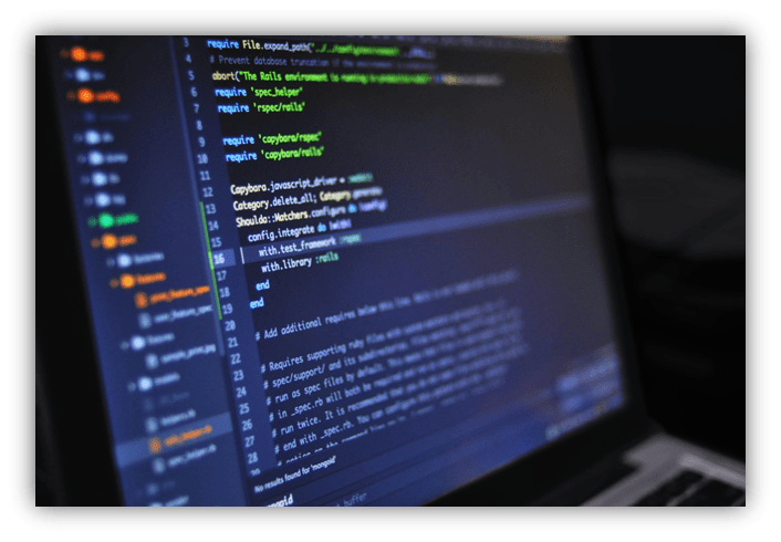"Close-up of coding software on a laptop screen, featuring Ruby on Rails syntax."