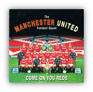 "Manchester United football squad group photo with trophy, iconic Old Trafford backdrop."