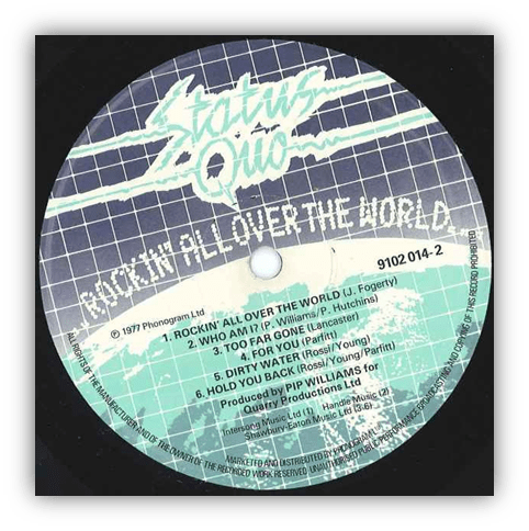 "Status Quo album 'Rockin' All Over the World' vinyl record label featuring tracklist and production details."