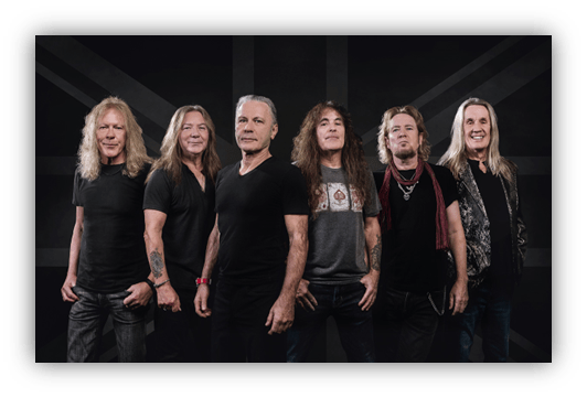 "Classic rock band posing in front of a Union Jack backdrop."
