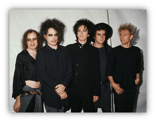 "Five musicians in dark clothing posing together, showcasing a gothic aesthetic."