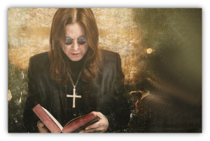 "Person in sunglasses reading a book with a cross necklace, set against a textured background."