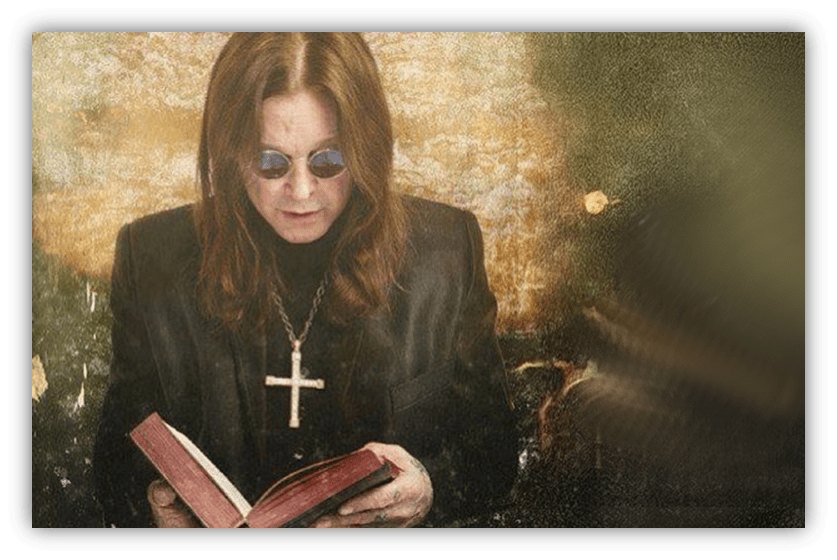 "Person in sunglasses reading a book with a cross necklace, set against a textured background."