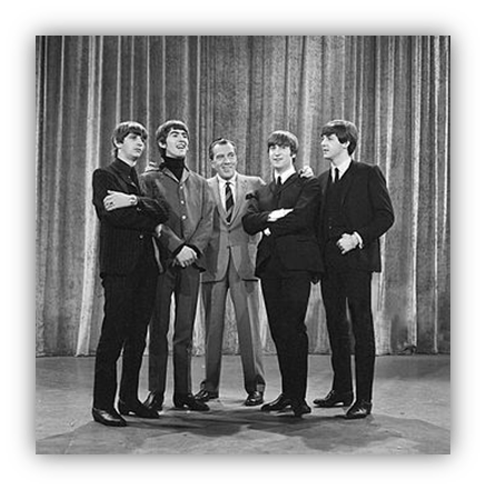"The Beatles with Ed Sullivan on stage, 1960s."