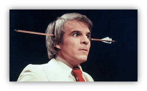 Man with an arrow through his head, showcasing a comedic scene.