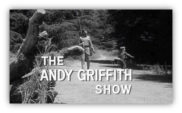 Alt text: "Title card of The Andy Griffith Show featuring a rural scene with a man and a child."