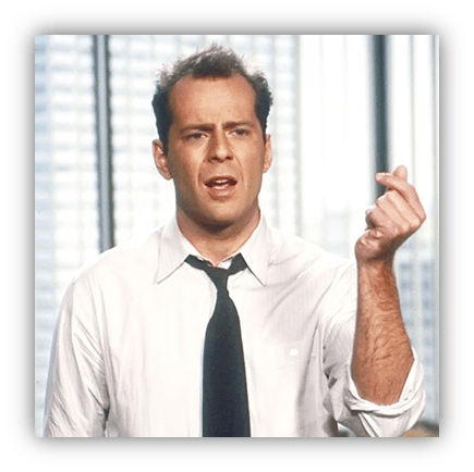 "Man in a white shirt and black tie gesturing expressively in an office setting."