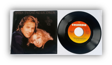 "Barbra Streisand and Don Johnson's 'Till I Loved You' vinyl record cover and disc."