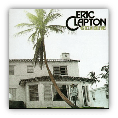 Album cover of Eric Clapton's "461 Ocean Boulevard" featuring a house and palm tree.