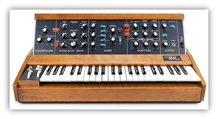 "Moog synthesizer with keyboard and control knobs, showcasing vintage electronic music equipment."