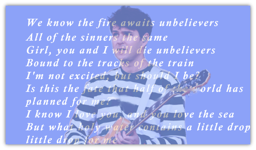 Alt text: "A musician holding a guitar, with song lyrics overlayed on a blue background."