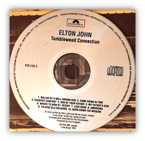 Alt text: "Elton John's Tumbleweed Connection CD label featuring tracklist and album details."