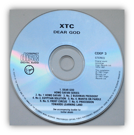 "XTC 'Dear God' CD with tracklist and Virgin Records branding."