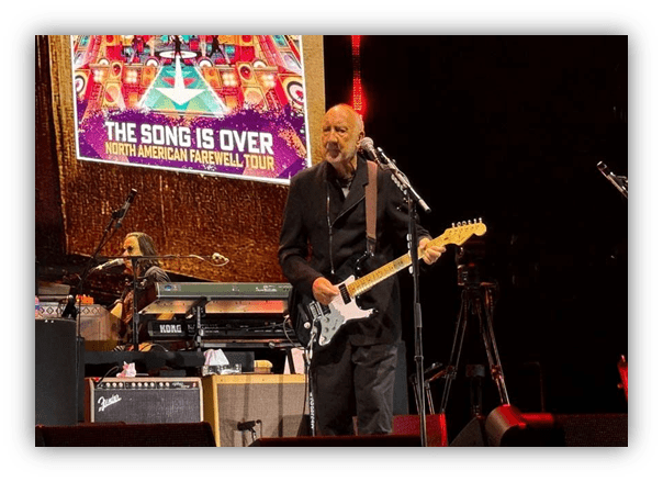 "Musician performing live on stage during 'The Song Is Over' North American Farewell Tour."