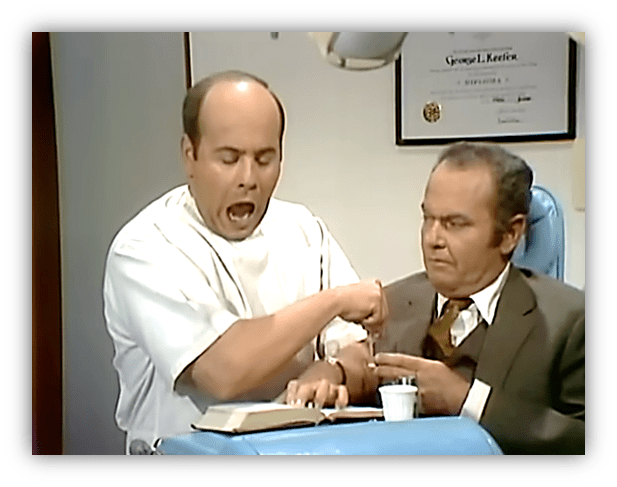 A dentist exaggeratedly yawning while administering treatment to a nervous patient in an office setting.