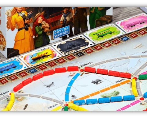 "Close-up of Ticket to Ride board game with colorful train pieces and destination cards."