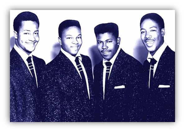Four male singers in matching suits, posing together in a classic black and white photo.