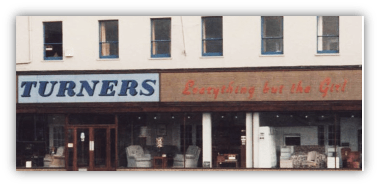 Historic storefronts featuring "Turners" and "Everything but the Girl."