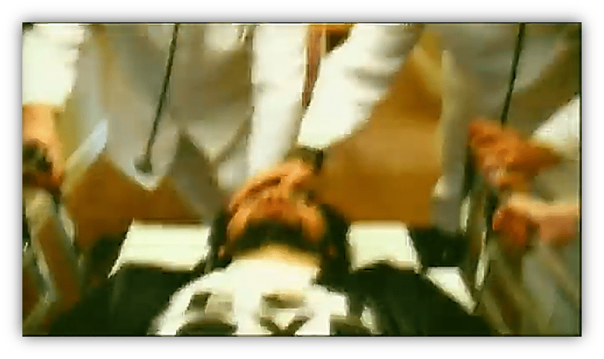 Medical personnel attending to a patient on a stretcher in a clinical setting.