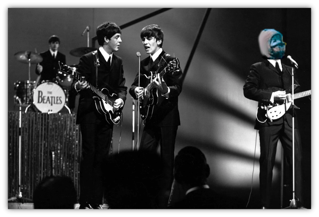 The Beatles performing live on stage in black and white.