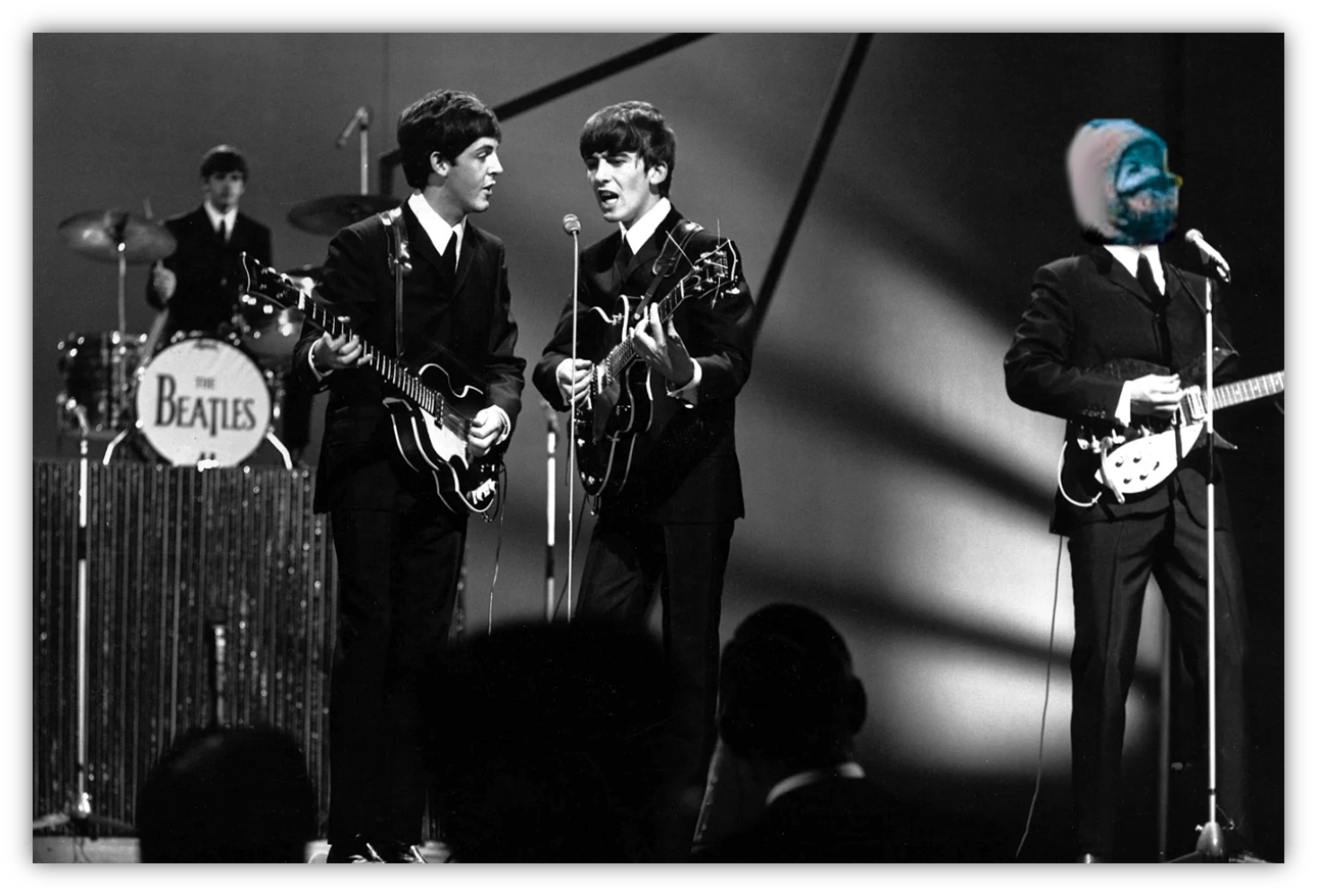 The Beatles performing live on stage in black and white.