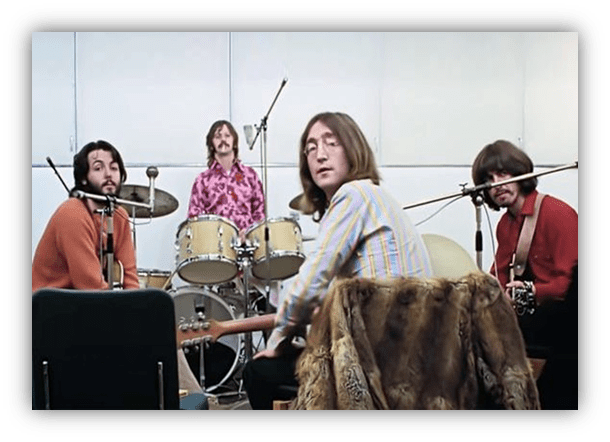 "The Beatles in studio, 1960s, recording session with instruments."