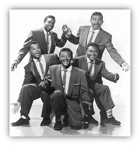 The Robins vocal group posing in stylish suits, showcasing their energetic performance style.