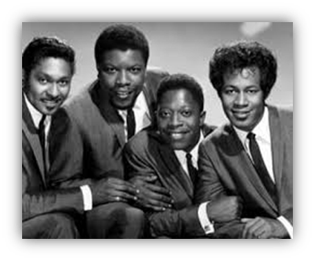 "Classic black and white photo of a four-member vocal group in suits."