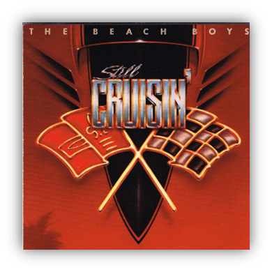 Album cover for "Still Cruisin'" by The Beach Boys featuring racing flags and a bold title.