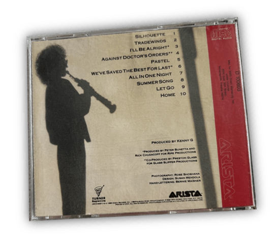 Alt text: "Back cover of a Kenny G CD featuring track list and production details."