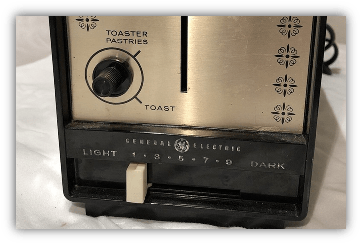 Vintage General Electric toaster with settings for toast and pastries.