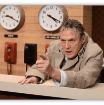 "Angry news anchor gesturing in a studio with clocks for Tokyo and Los Angeles in the background."