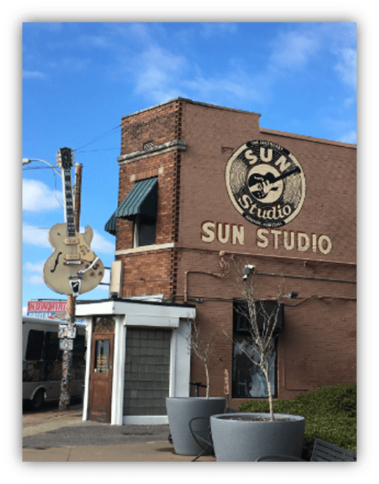 "Sun Studio building with iconic guitar sign in Memphis, Tennessee."