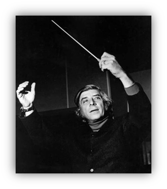 Conductor passionately leading an orchestra with a baton.