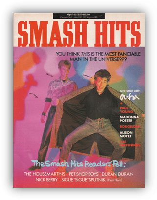 "Cover of Smash Hits magazine from December 1986 featuring colorful fashion and text highlighting popular music artists."