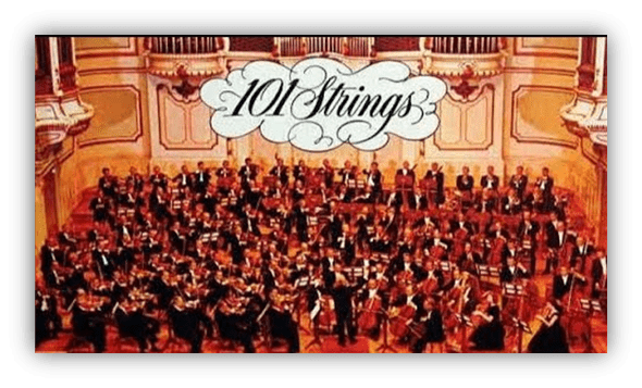 "101 Strings orchestra performing in a grand concert hall."