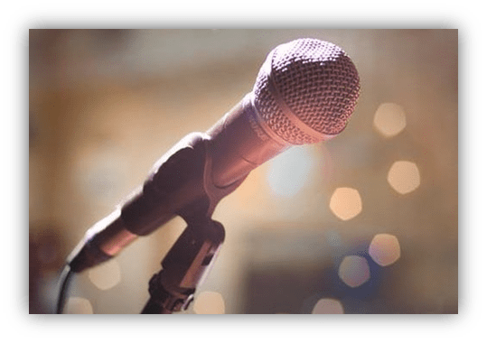 "Close-up of a microphone with a blurred background."