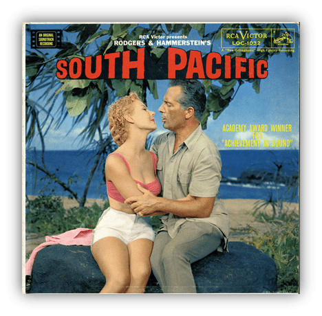 "South Pacific vinyl cover featuring a couple in a romantic pose, with tropical scenery in the background."