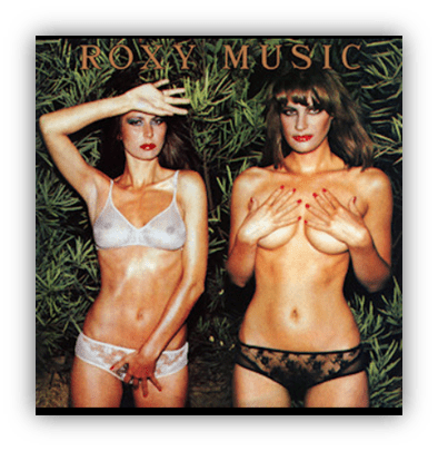 "Roxy Music album cover featuring two women posing in lingerie amidst greenery."