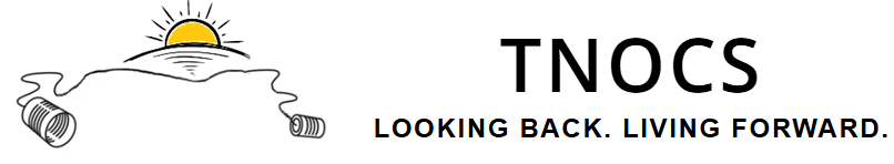 Alt text: "TNOCS logo with sun illustration and tagline 'Looking Back. Living Forward.'"